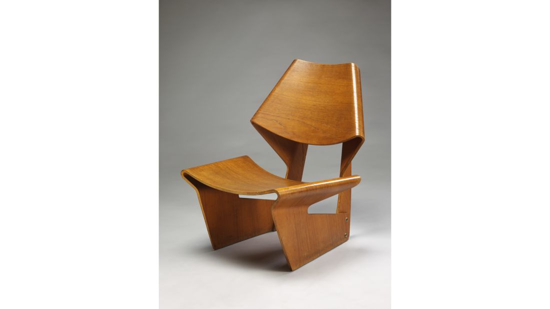 Danish designer Grete Jalk was inspired the Eameses and Alvar Aalto in her work. This molded plywood chair was formed out of just two conjoined pieces.