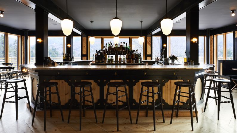 <strong>Prospect at Scribner's Lodge:</strong> A 360-degree bar with sweeping views of Hunter ski slopes and a list of mountain-appropriate cocktail selections (like the Burn't Maple Old Fashioned) are the central focus of the dining room at Prospect.