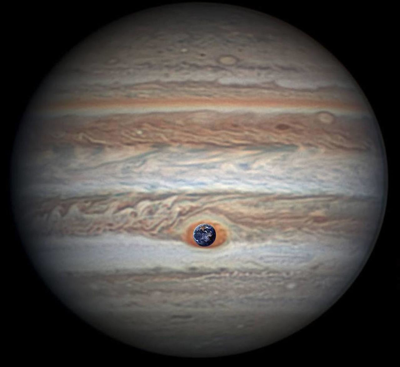 NASA configured this comparison of its own image of Earth with an image of Jupiter taken by astronomer Christopher Go. 