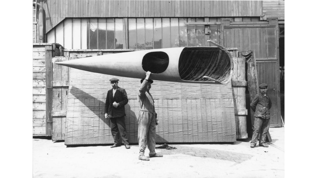 Almost all early airplanes were made out of wood, such as this complete Deperdussin Monocoque fuselage carried by workmen at the Paris Deperdussin factory in about 1912. 