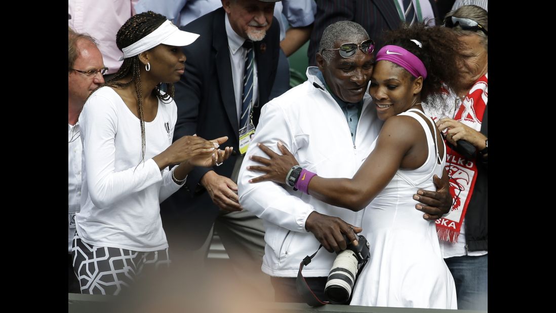 Venus watches Serena embrace their father after Serena won Wimbledon in 2012. A year earlier, Venus had been diagnosed with Sjogren's Syndrome, an autoimmune disorder that causes joint pain and can deplete energy levels. She took some time off but eventually returned.