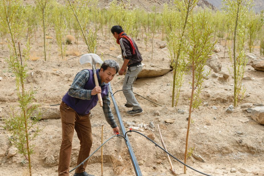 Sonam Wangchuk and a colleague create a drip irrigation network to use water from ice stupas.