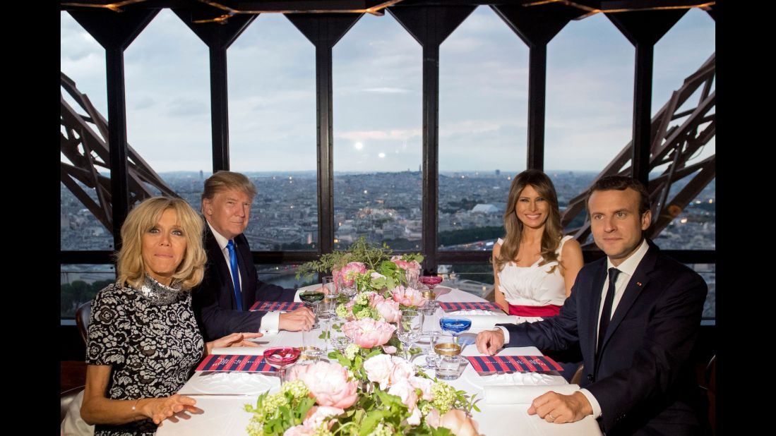 The couples dine at the Eiffel Tower restaurant on July 13. 