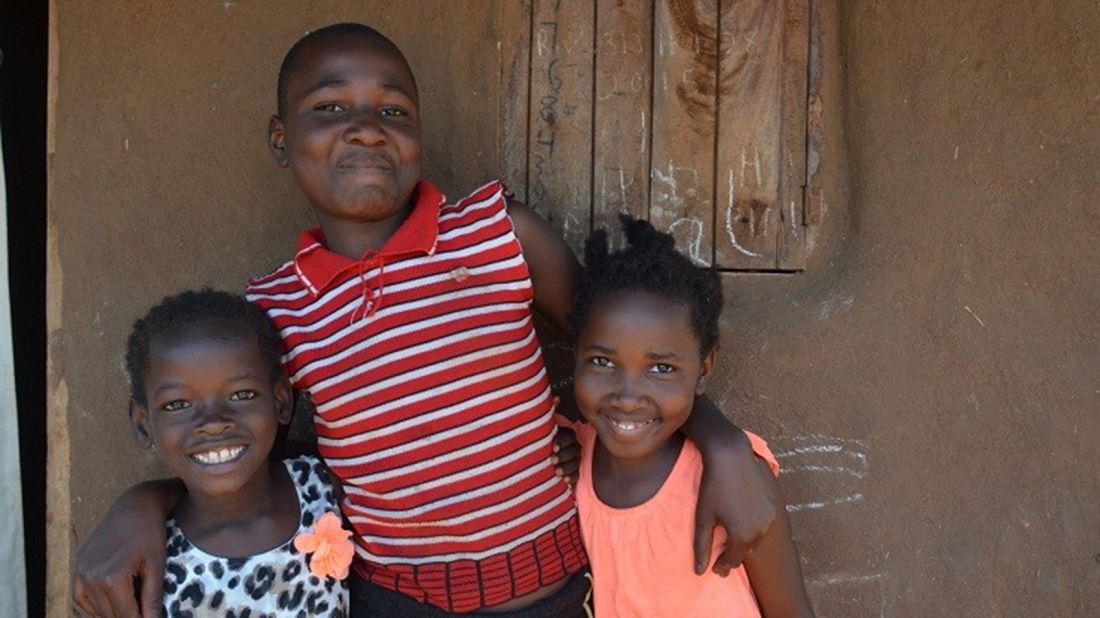 After her return, Violah, right, met with her sister, Resty, center, and Mata, left. Mata was taken from the same Ugandan village and also adopted by a US family. Like Violah, she was returned to her birth mother. <br />