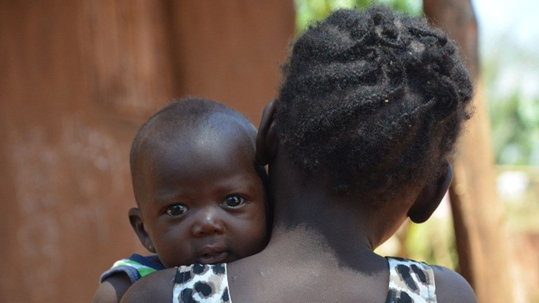 Mata holds her baby sister, whom she first met via Skype while talking with her mother from Ohio. It was during that call that Mata realized her mother hadn't given her up for adoption. "My mom was tricked," she says.<br />