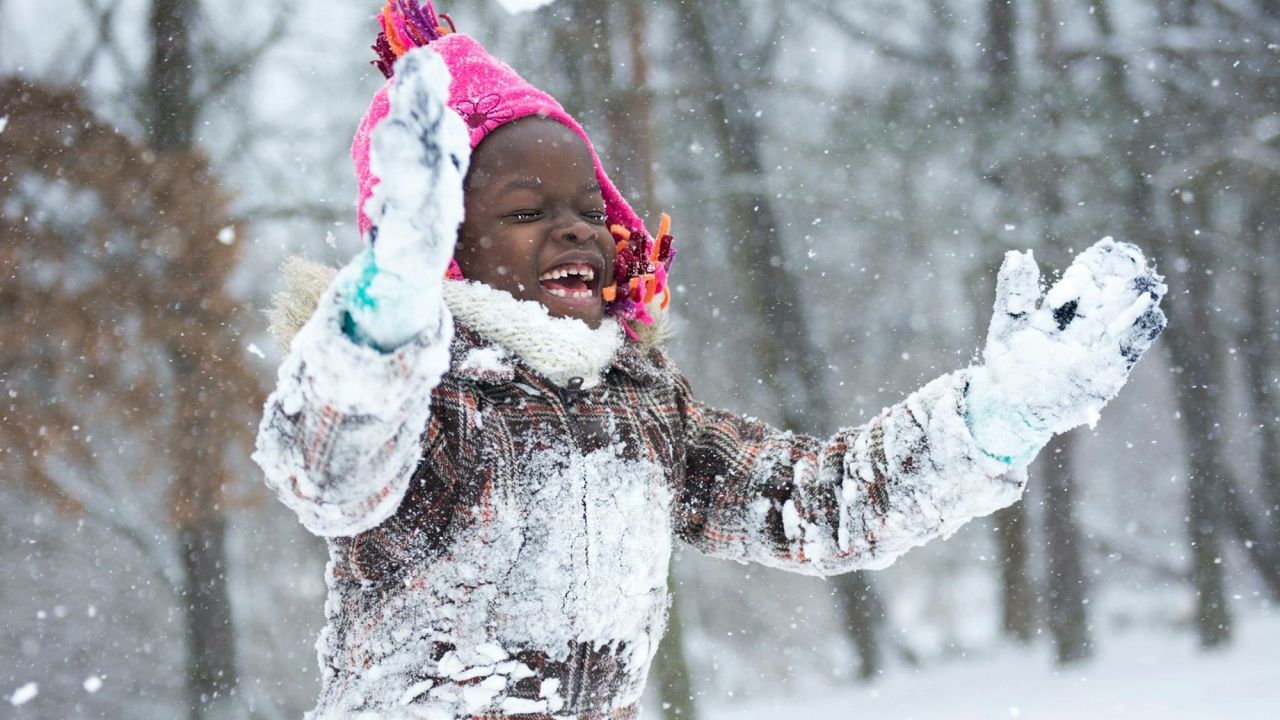 Mata saw snow in the US, a rarity in Uganda. Upon her return, she shared this picture with other children in her village.<br />