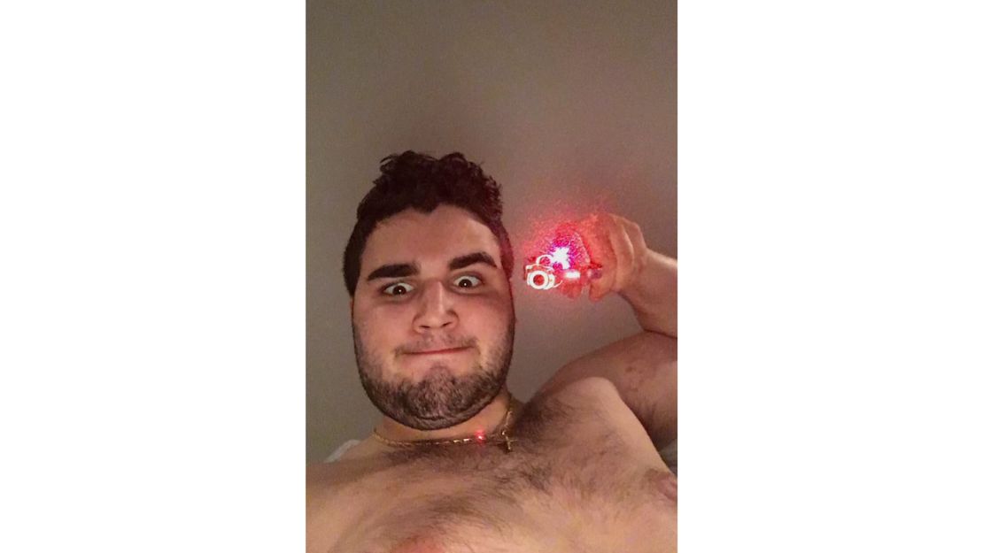 Alleged killer Cosmo Dinardo holds a firearm in an undated photo posted on social media.