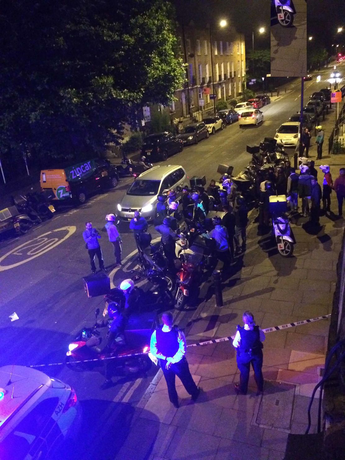 Emergency services attend the scene at Hackney Road.