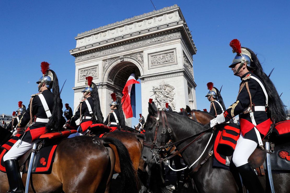 French Mounted Republican guards march during the traditional military parade as part of the Bastille Day military parade on the Champs Elysees avenue in Paris on July 14, 2017.