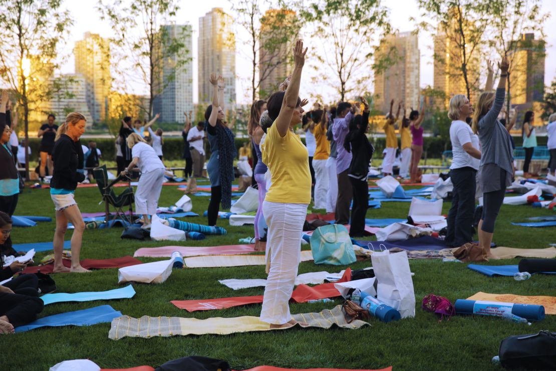 On mats dotting the UN's North Lawn, participants try to block out city noise in search of peace.