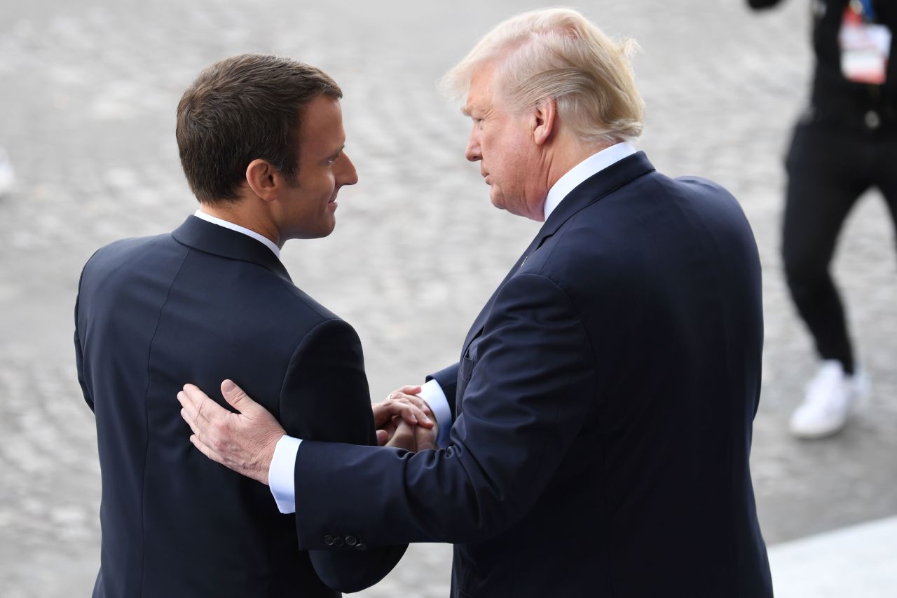 Macron bids farewell to Trump following the Bastille Day military parade on the Champs-Elysees in Paris. Macron has sought to act as Trump's bridge to Europe, his advisers have said, as other leaders there have isolated the United States on key issues.