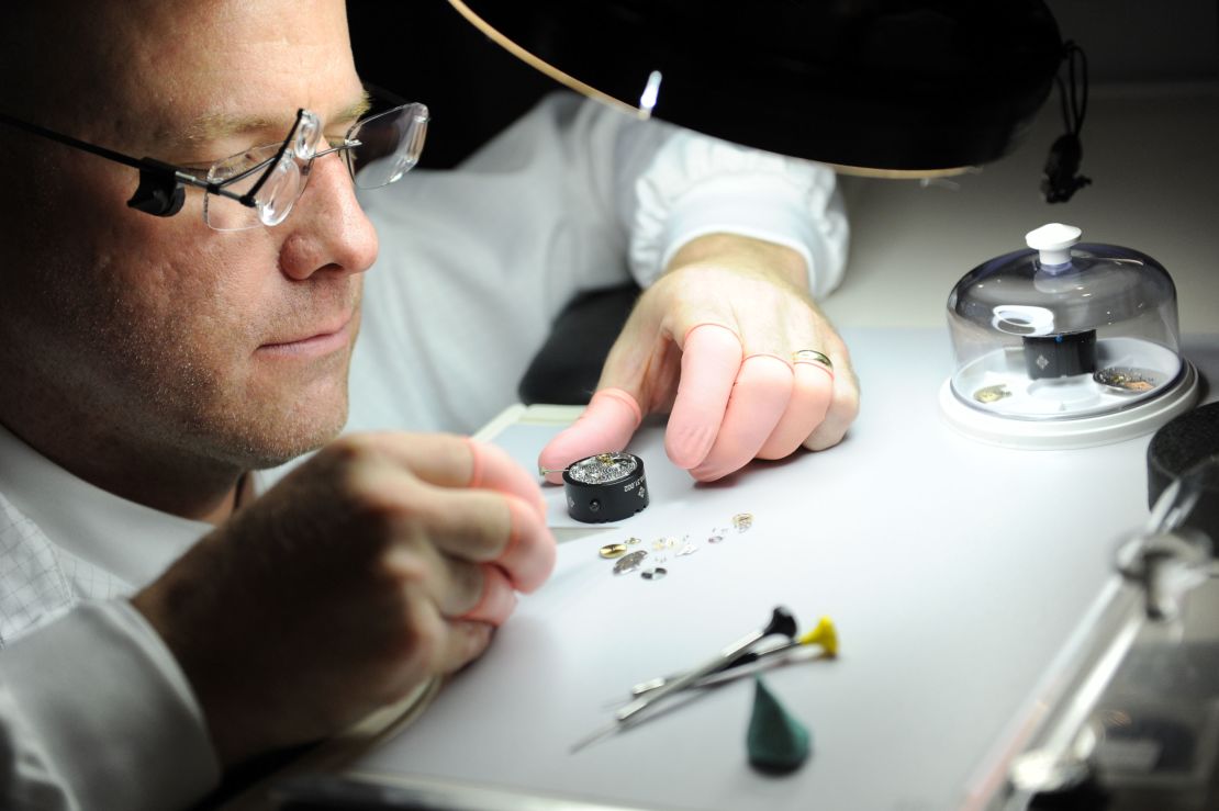 A watchmaker at work at Patek Philippe's "The Art Of Watches" exhibition at Cipriani 42nd Street in New York 