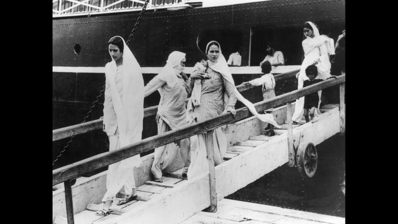 Hindu and Sikh women arrive in Mumbai with their children on a British-India liner after flying from Pakistan on October 9, 1947.<br /><br />Women were the victims of brutal violence during partition. It is estimated that <a  target="_blank" target="_blank">75,000 women</a> were abducted and raped.