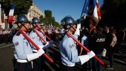 French firefighters prepare to take part in the annual Bastille Day military parade on the Champs-Elysees avenue in Paris on July 14, 2017. / AFP PHOTO / GEOFFROY VAN DER HASSELT        (Photo credit should read GEOFFROY VAN DER HASSELT/AFP/Getty Images)