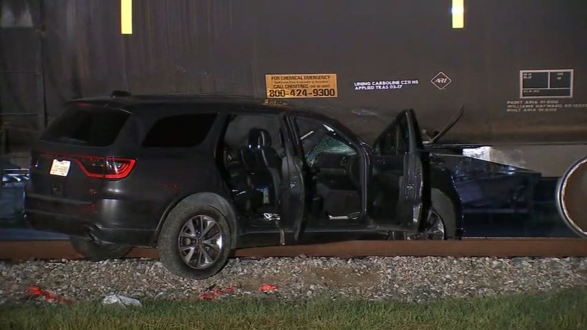 Car with two occupants was dragged 100 yards after being wedged under train in Texas, police said 