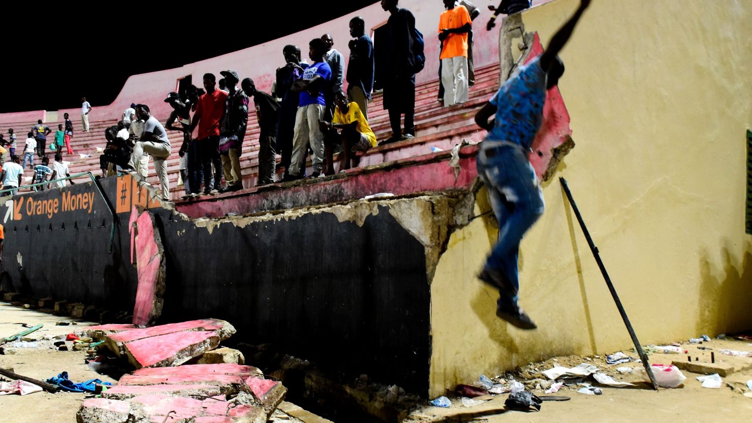 A wall collapsed at Demba Diop Stadium in Dakar after clashes broke out between football fans.