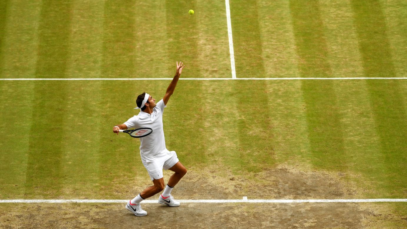 Federer serves at the beginning of the match.