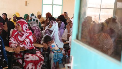 Members of an Agadez women's group listen during a workshop led by the US Army. "The closer we build a relationship with a local community wherever we are, it helps maintain our safety, it helps to maintain our security," says Captain Kyle Staron.