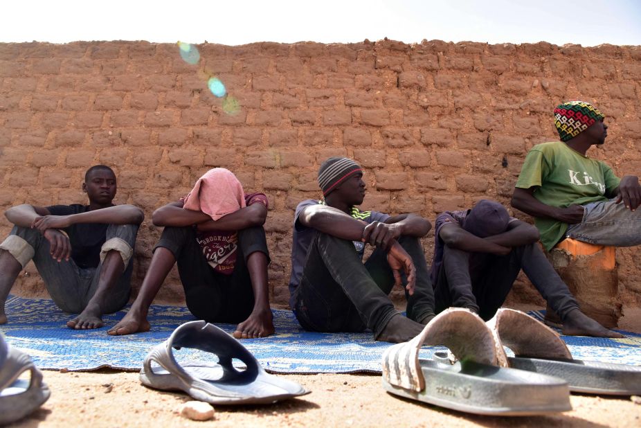 Migrants from West Africa wait in the city ahead of their journey to Libya, from where they will attempt to reach Europe by crossing the Mediterranean Sea.