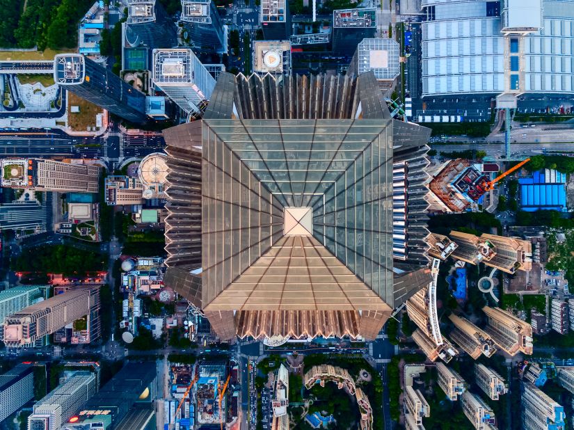 The Ping An Finance Center rises 555 meters, or 1,821 feet. 