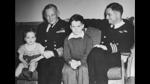 McCain sits with his grandfather and his father, both of whom were Navy admirals, in this family photo from the 1940s.