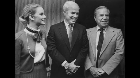 McCain, center, and his wife, Cindy, pose with US Rep. John Rhodes after McCain was elected to the House in 1982. McCain has represented Arizona ever since. In 1986, he became a US senator.