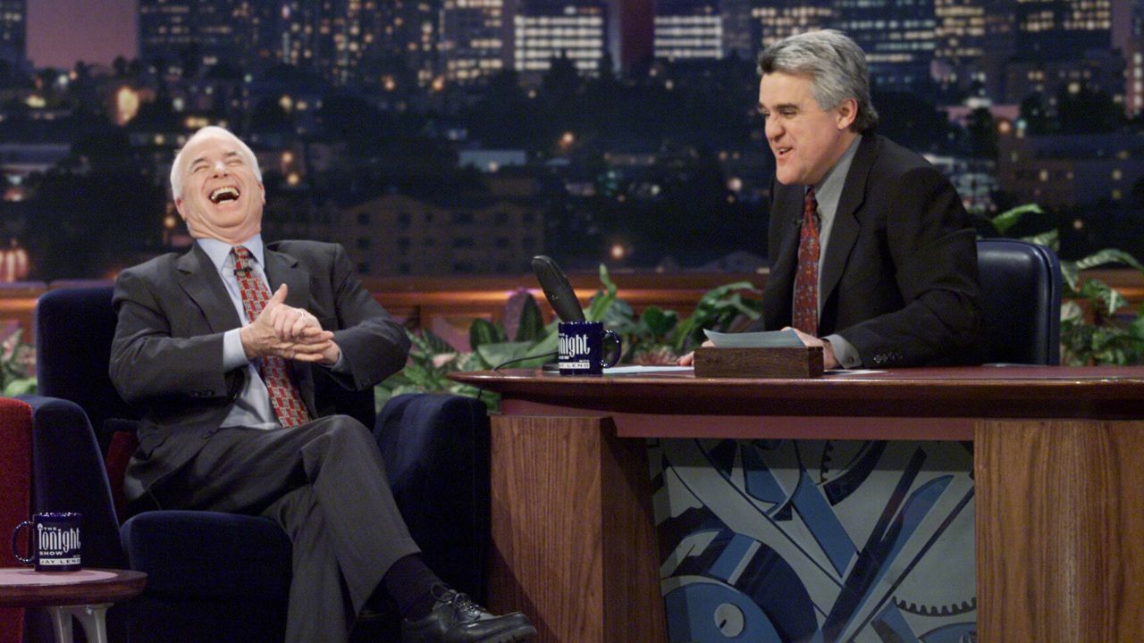 McCain laughs during an interview with "Tonight Show" host Jay Leno in 2000.