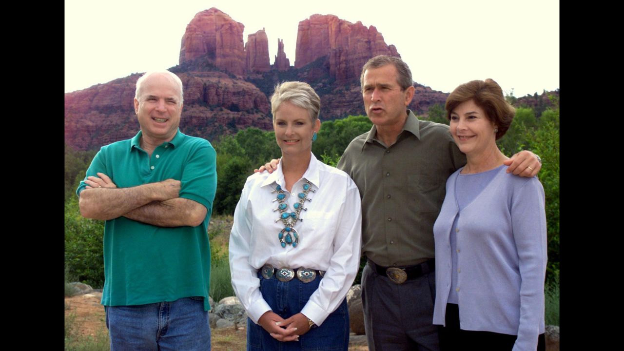 McCain and his wife host George W. Bush and his wife, Laura, at the Arizona's Red Rock Crossing in 2000. 
