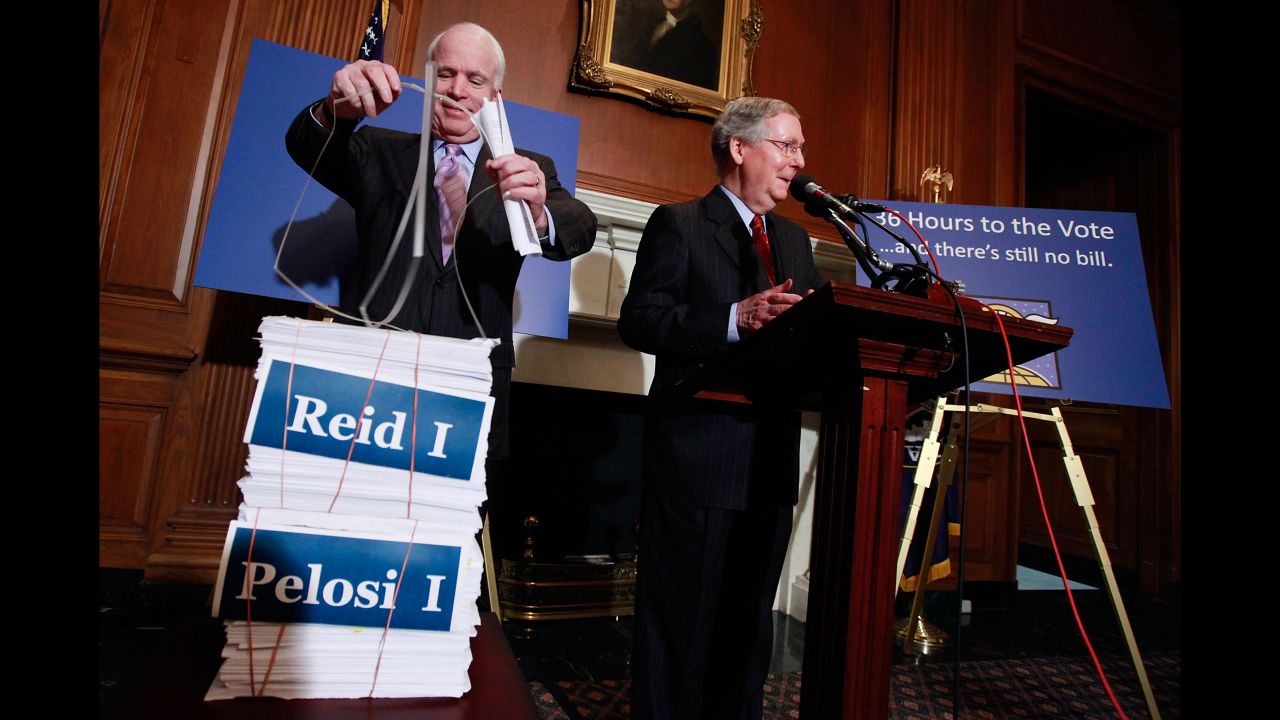 McCain and US Sen. Mitch McConnell speak about health care reform in 2009.