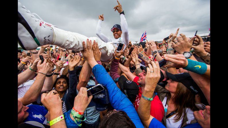 Lewis Hamilton of Mercedes and Great Britain celebrates after <a href="index.php?page=&url=http%3A%2F%2Fbleacherreport.com%2Farticles%2F2721938-lewis-hamilton-wins-2017-british-f1-grand-prix-after-punctures-collapse-ferrari" target="_blank" target="_blank">winning the Formula One Grand Prix of Great Britain</a> at Silverstone on Sunday, July 16, in Northampton, England.