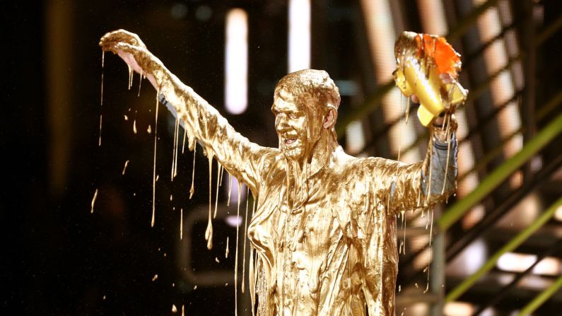 Michael Phelps reacts after getting slimed while accepting the Legend Award during the Nickelodeon Kids' Choice Sports Awards 2017 on Thursday, July 13, in Los Angeles.
