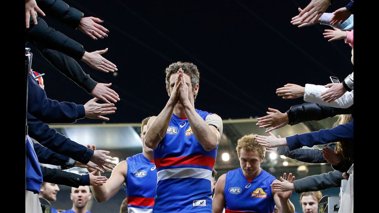 Robert Murphy of the Bulldogs leads his team after the AFL match between the Carlton Blues and the Western Bulldogs on Sunday, July 16, in Melbourne, Australia.