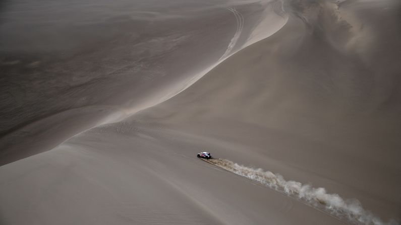 The car of Sebastien Loeb and Daniel Elena races in the Silk Way 2017 between Urumqi and Hami, China, on Monday, July 17.