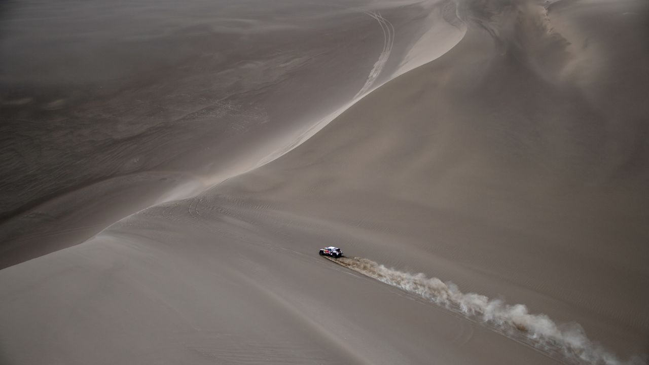 The car of Sebastien Loeb and Daniel Elena races in the Silk Way 2017 between Urumqi and Hami, China, on Monday, July 17.