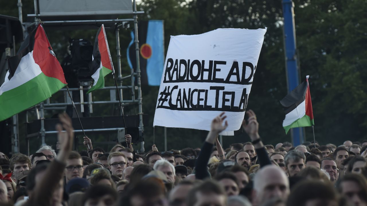 Protesters against Radiohead's planned concert in Tel Aviv at a show in Glasgow, Scotland.