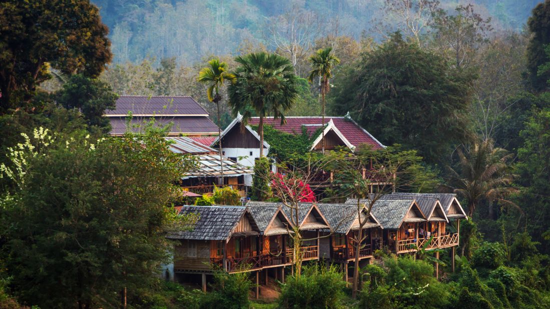 <strong>Nong Kiau Village:</strong> Set in the dense jungles of northern Laos, Nong Kiau Village is easily accessible via boats and kayaks on Nam Ou River. It's a great place for hiking, too, thanks to dramatic canyons, small footpaths, and limestone caves in the hills. 