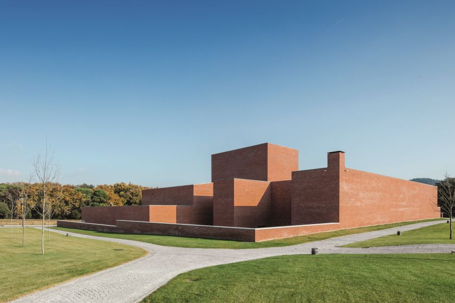 This red brick box theater in a small village just outside of Barcelona was commissioned as part of a public investment in cultural facilities. Designed by Portuguese architect Álvaro Siza, the seemingly windowless building consists of two parts: one containing a 300-seat auditorium and the other housing the theater's offices. 