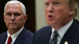 WASHINGTON, DC - JULY 18:  U.S. Vice President Mike Pence listens as President Donald Trump speaks to members of the media during a lunch with armed service members at the Roosevelt Room of the White House July 18, 2017 in Washington, DC. President Trump took questions from the press and discussed the status of the healthcare legislation. (Photo by Alex Wong/Getty Images)