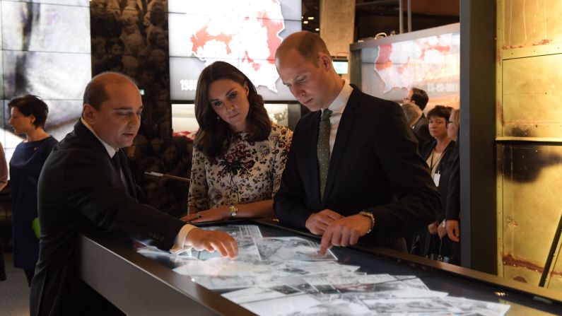 Basil Kerski, director of the European Solidarity Centre, accompanies the royals on July 18, as they visit Gdansk, Poland.