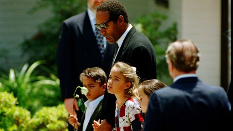 Simpson and his children attend Nicole Brown Simpson's funeral in June 1994.