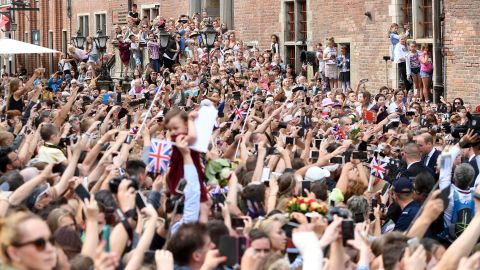 A crowd lines the street to greet the royal couple during their visit to Gdansk, Poland.