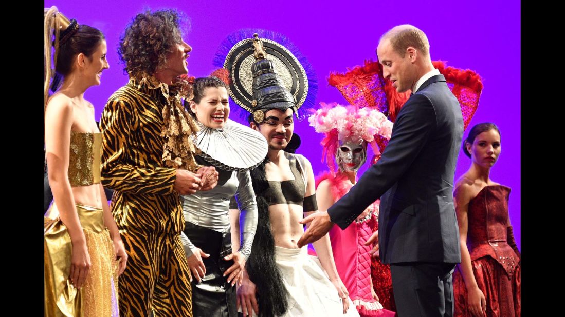 Prince William visits with performers from Gdansk Shakespeare Theatre, of which he is a patron, on July 18, in Gdansk, Poland.