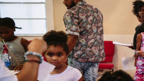 Congregants take part in Bible study inside Rosedale Missionary Baptist Church. A triple homicide occurred across the street from the church. Residents say they wish more churches had activities to keep young people off the streets.