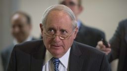 US Senator Carl Levin, D-Michigan, walks to a closed meeting on Iraq and Afghanistan on Capitol Hill in Washington, DC, July 8, 2014. 