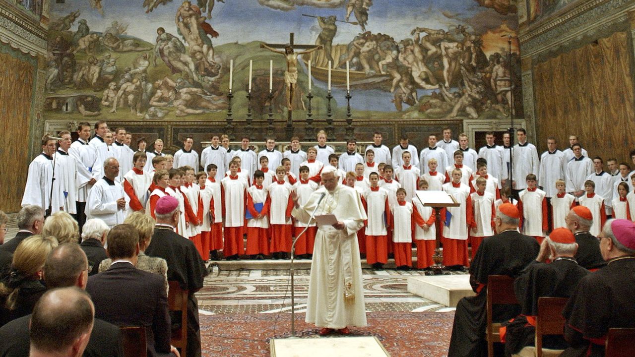 VATICAN CITY- OCTOBER 22:  Pope Benedict XVI attends a concert by the Regensburger Domspatzen boys choir at the Sistine Chapel, on October 22 , 2005 in Vatican City. The choir performed a piece of music written by the Pope's brother Monsignor Georg Ratzinger.  (Photo by L' Osservatore Romano-Vatican Pool/Getty Images)
