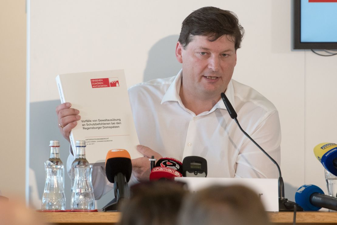 Lawyer Ulrich Weber presents his report during a press conference on July 18, in Regensburg.