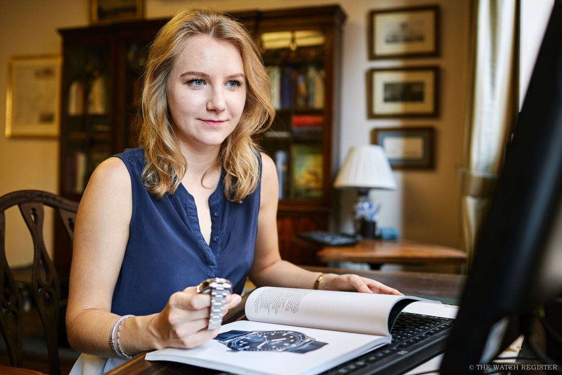 Katya Hills, managing director of the Watch Register, checks a watch against the database.