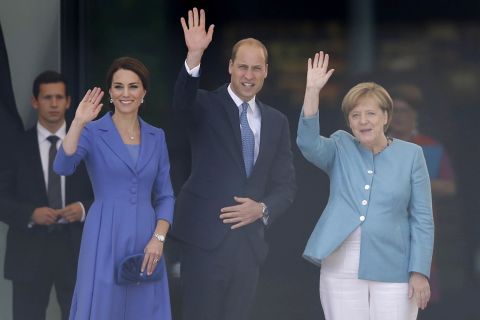 Kate, William and Merkel greet well-wishers shortly after the royal couple's arrival in Berlin.