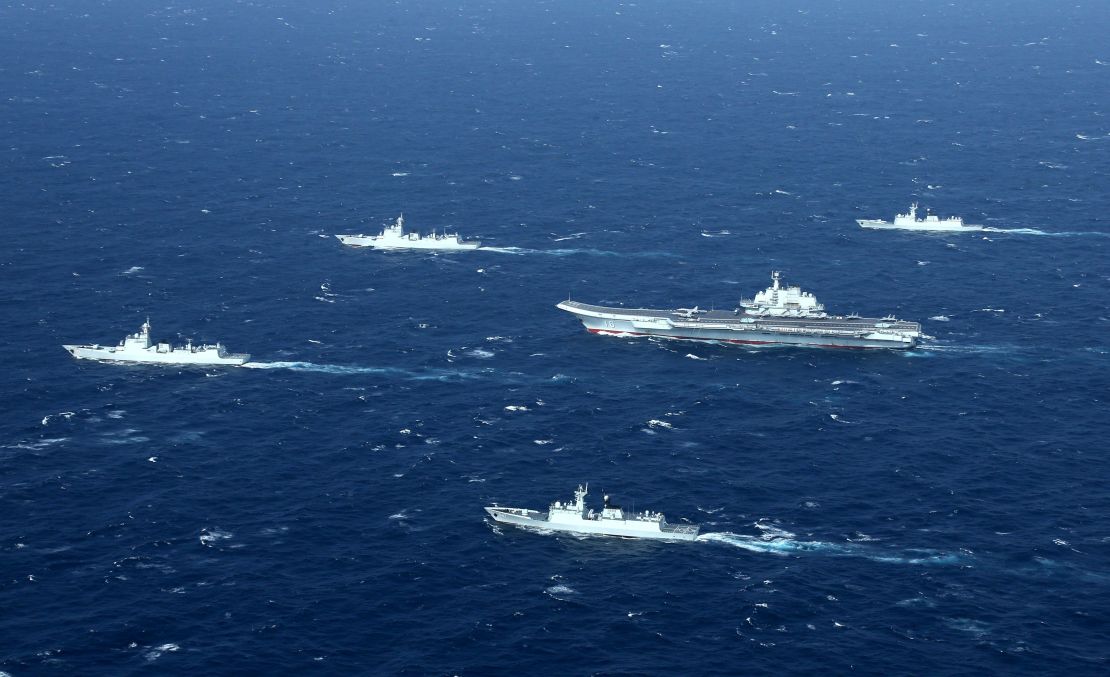 This aerial photo taken on January 2, 2017 shows a Chinese navy formation, including the aircraft carrier Liaoning (C), during military drills in the South China Sea.
