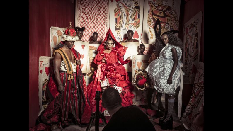 Djimon Hounsou as the King of Hearts and Duckie Thot as Alice flank RuPaul as the Queen of Hearts. 